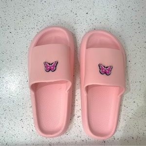 New pink butterfly slides. Size 8.5 women’s.